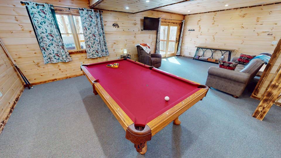 willifeesp-mar26-13 Winter wonderland view of the cabin covered in a light dusting of snow.