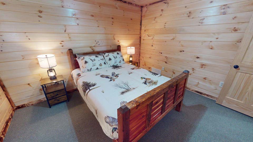 willifeesp-mar26-16 Cozy reading nook inside the cabin with a view of the woods.