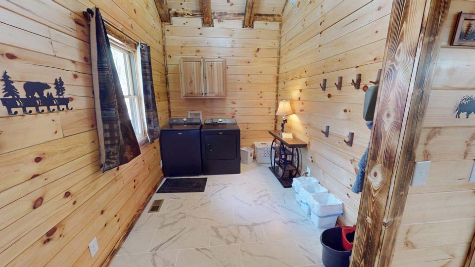 willifeesp-mar26-6 Kids laughing while exploring the games provided by Twilight Ridge Cabins.